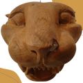 Cabeza de jaguar de madera