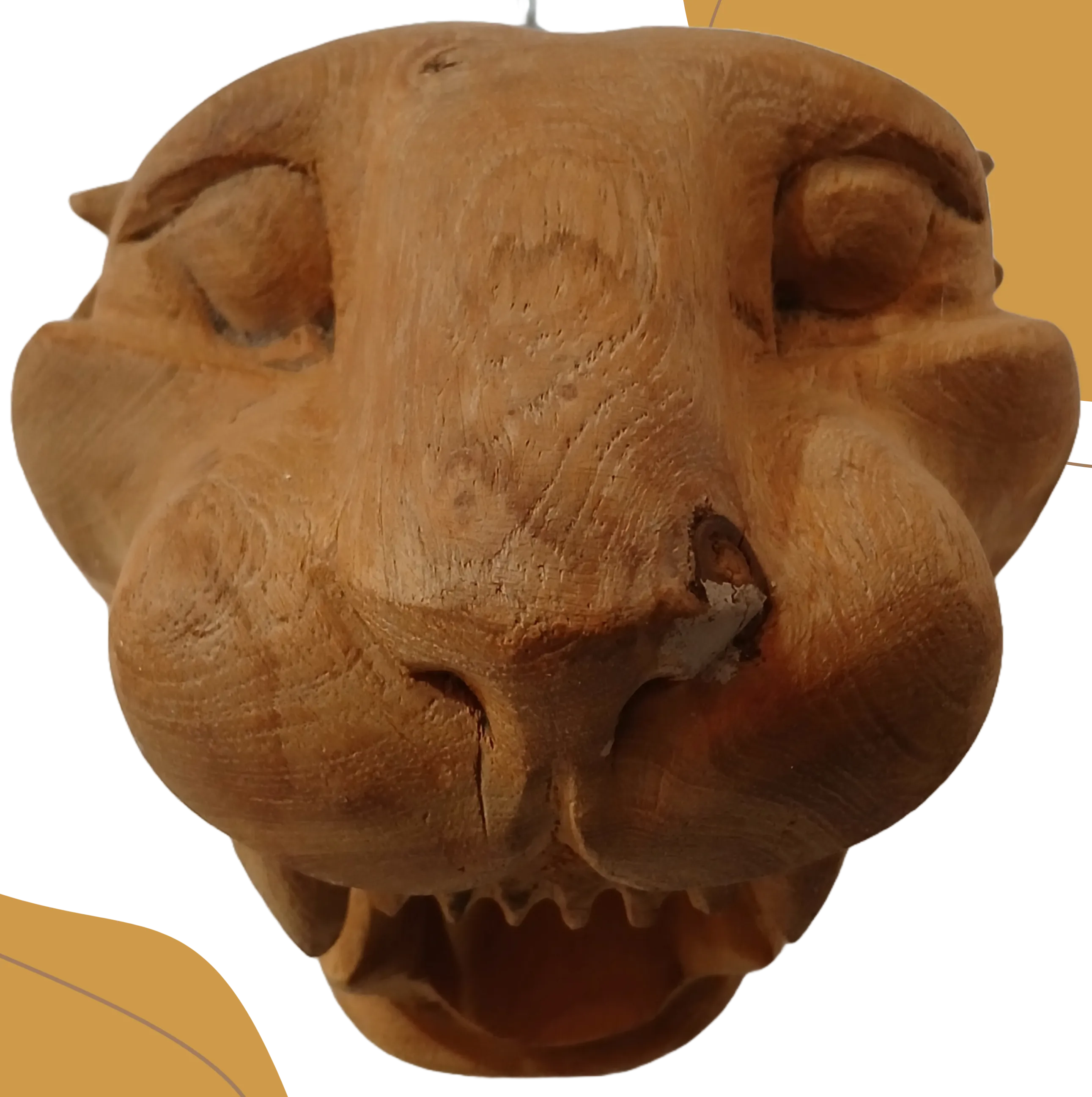 Cabeza de jaguar de madera