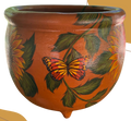 Macetero con mariposa monarca
