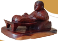 Mujer con metate