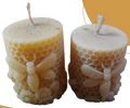 Velas de cera con abejas
